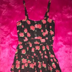 Women’s little black dress with roses